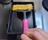 奥へ押しやる