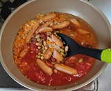 煮込む