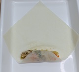 手前の角であんを巻く