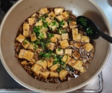 青ねぎを加えて大きく混ぜる